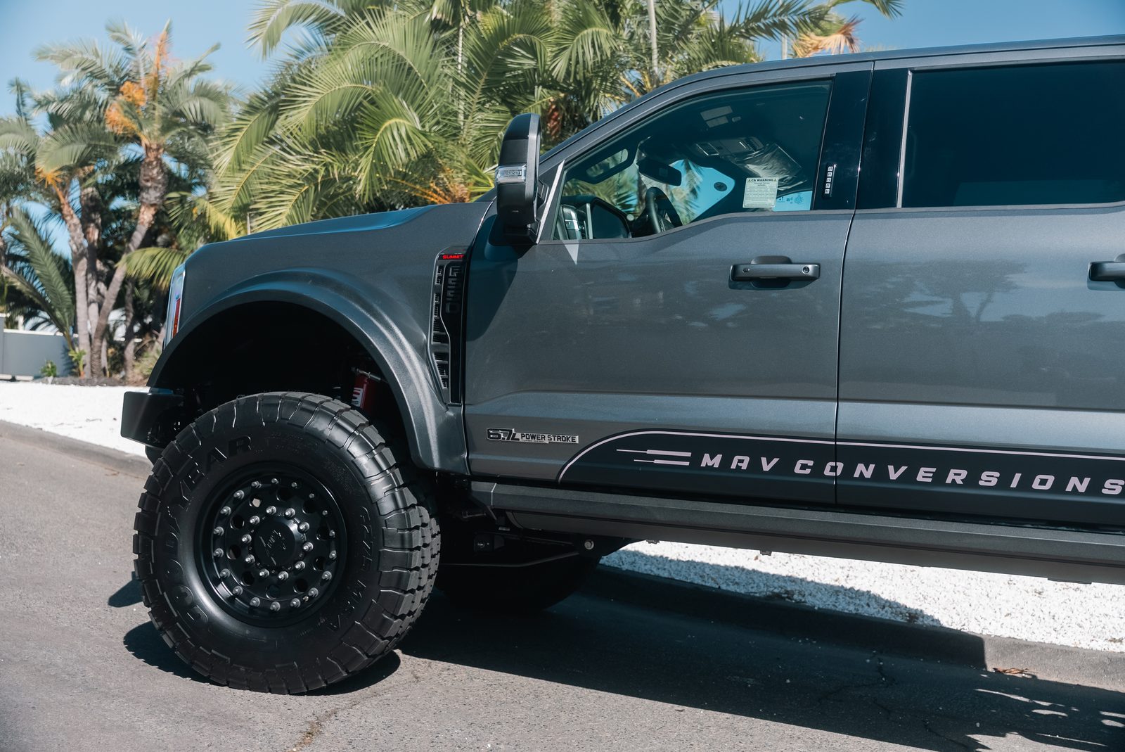 Front three-quarter view of a lifted Ford F-550 by MAV Conversions